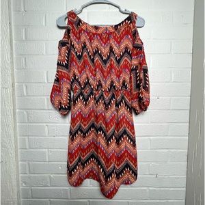 Xtaren dress multi color with shoulder cut out size M